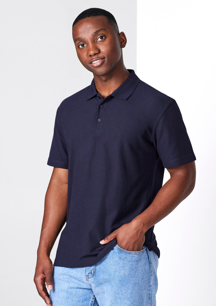 Image depicting a man in a Pique Knitted Flat Collar Men's Polo at a casual business meeting.