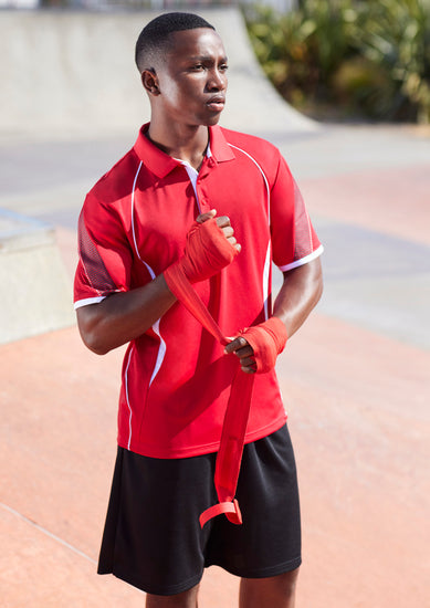 Image depicting a man wearing a Merina Polyester Men's Polo in an office environment.