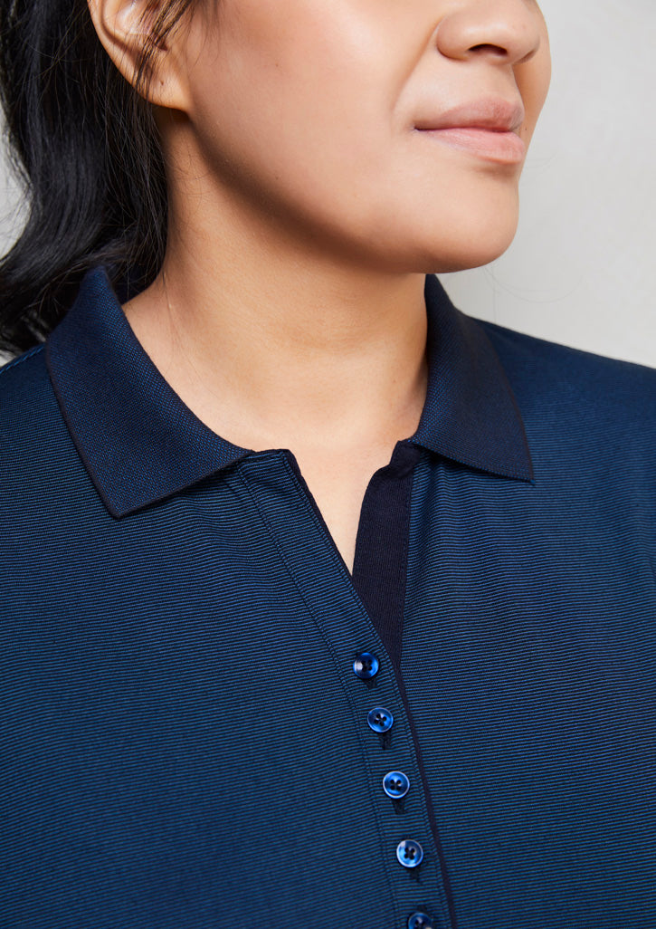 Image showing a woman wearing a Midnight Cross-Dyed Fabric Women's Polo at a night out.