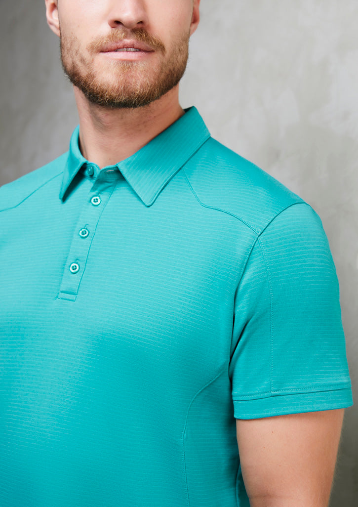 Image of a man wearing an Oxbow Cotton Polyester Men's Polo at a casual gathering.