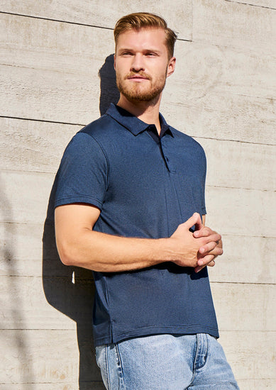 Image of a man in a Midnight Cross-Dyed Fabric Men's Polo at an evening social event.