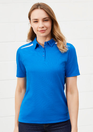 Image of a woman wearing a Solar Polyester Cotton Knit Women's Polo at a casual event.